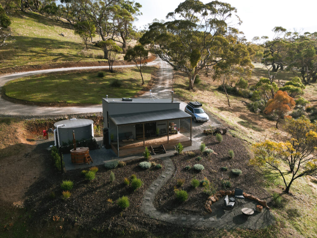 Aerial view of Kaiser tiny house surrounded by bushland in the Barossa Valley